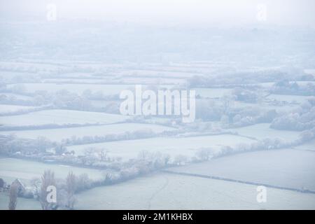 Brighton, December 11th 2022: Frosty conditions in the South Downs National Park at Devil's Dyke this morning looking across the Weald of Sussex. Stock Photo