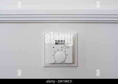 White light switch, turn on or turn off the lights. Regulator of electric switch of candle-power Stock Photo
