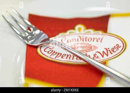 Mettingen, Germany. 13th Dec, 2022. A fork lies on a napkin of the food manufacturer Coppenrath & Wiese, taken during the company's annual press conference. The management of Germany's largest frozen baked goods manufacturer wants to take stock of the 2022 financial year and provide an outlook for 2023. Credit: Friso Gentsch/dpa/Alamy Live News Stock Photo