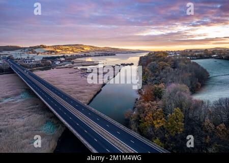 Sunrise over Newton Abbot Bridge and River Teign from a drone, Newton Abbot, , Devon, England, Europe Stock Photo