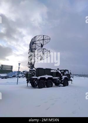 Satellite dishes or radio antennas sky. mobile air defense truck with radar antenna. Stock Photo