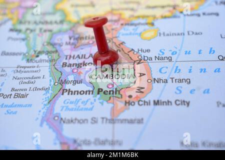 Red Push Pin Pointing on Location of Cambodia World Map Close-Up View Stock Photograph Stock Photo