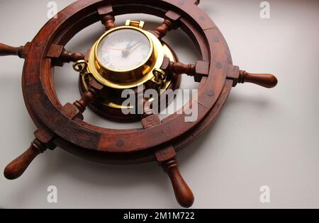 Yacht Steering Wheel With Arrow Clock In Copper Edging Angle View Stock Photo Stock Photo