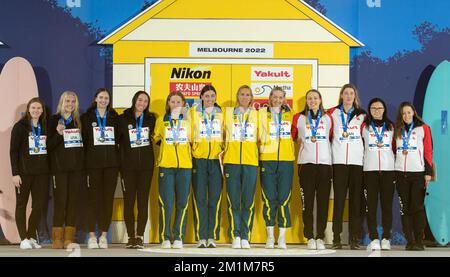 Melbourne, Australia. 13th Dec, 2022. Members of team Australia (C), team the United States (L) and team Canada pose for photos during the awarding ceremony of the women's 4x100m freestyle relay at the 16th FINA World Swimming Championships (25m) 2022, in Melbourne, Australia, on Dec. 13, 2022. Credit: Hu Jingchen/Xinhua/Alamy Live News Stock Photo