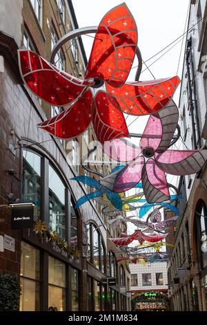London, UK - 10 December 2022, Slingsby Place at Christmas with a big flower Stock Photo