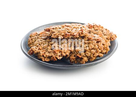 Oatmeal cookies on plate isolated on the white background. Stock Photo