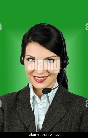 Portrait of beautiful helpdesk or support operator woman answering at your questions Stock Photo