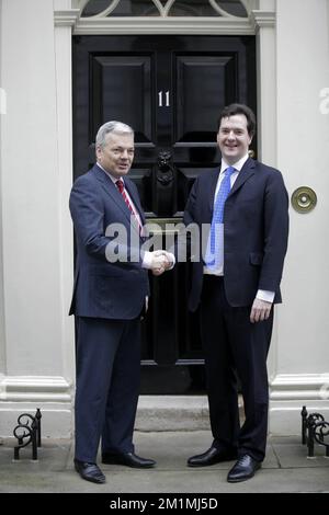 20120109 - LONDON, UNITED KINGDOM: Belgium Vice-Prime Minister and Foreign Minister Didier Reynders and British Chancellor of the Exchequer George Osborne pictured at 11 Downing Street during a visit of Didier Reynders to his British counterpart William Hague, Monday 09 January 2012, in London, England. BELGA PHOTO NICOLAS MAETERLINCK Stock Photo