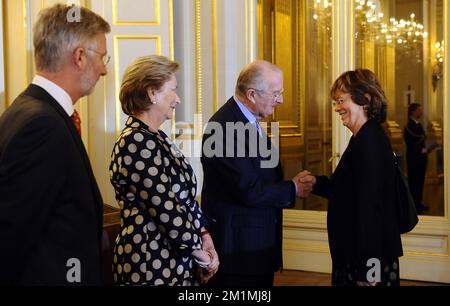 20120125 - BRUSSELS, BELGIUM: Crown Prince Philippe of Belgium, Queen Paola of Belgium and King Albert II of Belgium welcome European Parliament Vice President Isabelle Durant as the Belgian Royal Family receives the chairmen and presidents of the European institutions, the European Commissioners and other representatives of the European institutions, at the Royal Castle in Laeken/Laken, Brussels, Wednesday 25 January 2012. BELGA PHOTO BENOIT DOPPAGNE Stock Photo