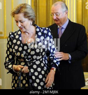 20120125 - BRUSSELS, BELGIUM: King Albert II of Belgium and Queen Paola of Belgium arrive at a reception with chairmen and presidents of the European institutions, the European Commissioners and other representatives of the European institutions, at the Royal Castle in Laeken/Laken, Brussels, Wednesday 25 January 2012. BELGA PHOTO BENOIT DOPPAGNE Stock Photo