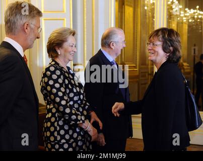 20120125 - BRUSSELS, BELGIUM: Crown Prince Philippe of Belgium, Queen Paola of Belgium and King Albert II of Belgium welcome European Parliament Vice President Isabelle Durant as the Belgian Royal Family receives the chairmen and presidents of the European institutions, the European Commissioners and other representatives of the European institutions, at the Royal Castle in Laeken/Laken, Brussels, Wednesday 25 January 2012. BELGA PHOTO BENOIT DOPPAGNE Stock Photo