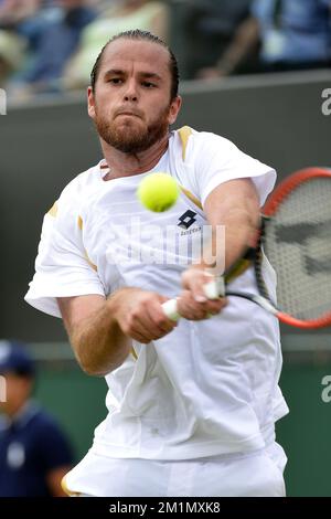 20120628 - LONDON, UNITED KINGDOM: Belgian Xavier Malisse pictured during the second round match of Belgian Xavier Malisse (ATP 75) against French Gilles Simon (ATP 13) at the men's singles at the 2012 Wimbledon grand slam tennis tournament at the All England Tennis Club, in southwest London, Thursday 28 June 2012. BELGA PHOTO DIRK WAEM Stock Photo
