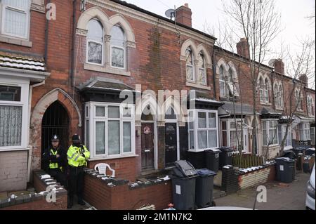 Clarence Road, Handsworth, 13th December 2022. Police guard the garden to the rear of a property where detectives have today (Tuesday 13 December) begun searching the garden of a Handsworth property following information on the possible burial of human remains. Information was received relating to the death of a child at a house in Clarence Road in 2020 and an investigation has been launched. Two people, a man, aged 40 and a woman aged 41, were arrested on 9 December on suspicion of causing or allowing the death of a child and wilful neglect. Credit: Sam Holiday/Alamy Live News Stock Photo