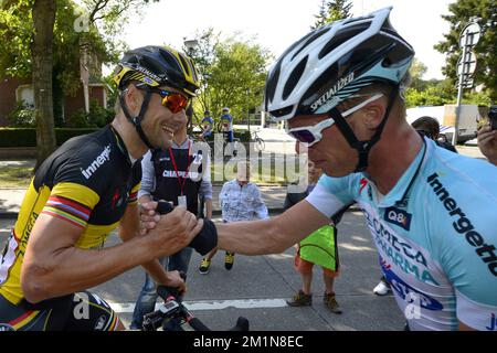 20120831 - ANTWERP, BELGIUM: Belgian national champion Tom Boonen of team Omega Pharma - Quick Step and German Tony Martin of team Omega Pharma - Quick Step pictured after the first stage of the first edition of the World Ports Cycling Classic, Friday 31 August 2012 in Antwerp. BELGA PHOTO DIRK WAEM Stock Photo