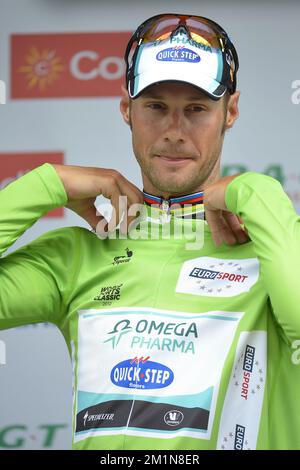 20120831 - ANTWERP, BELGIUM: Belgian national champion Tom Boonen of team Omega Pharma - Quick Step celebrates on the podium after winning the first stage of the first edition of the World Ports Cycling Classic, Friday 31 August 2012 in Antwerp. BELGA PHOTO DIRK WAEM Stock Photo