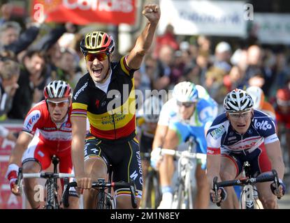 20120831 - ANTWERP, BELGIUM: Belgian national champion Tom Boonen of team Omega Pharma - Quick Step (C) and German Andre Greipel of Lotto - Belisol (R) sprint for the finish of the first stage of the first edition of the World Ports Cycling Classic, Friday 31 August 2012 in Antwerp. BELGA PHOTO DIRK WAEM Stock Photo