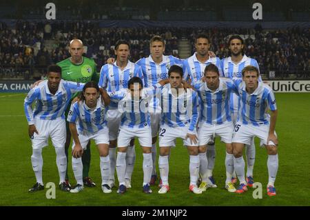 20121003 - BRUSSELS, BELGIUM: Malaga's players pose for the team picture at the start of the match between RSCA Anderlecht and Spanish club Malaga CF, on the second day of the group stage (group C) of the UEFA Champions League tournament, in Brussels, Wednesday 03 October 2012. BELGA PHOTO ERIC LALMAND Stock Photo