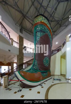 Tsonjin Boldog, Ulaanbaatar, Mongolia - September, 2022 - Inside of a Chinggis Khaan sculpture museum. Giant leather boot sculpture. Stock Photo