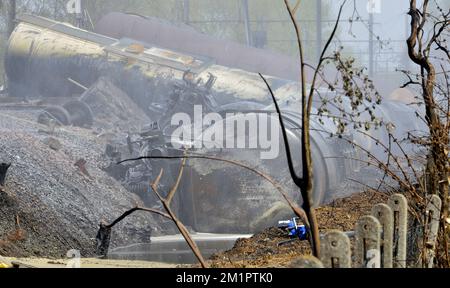 Illustration picture shows the train wreck in Wetteren, Monday 06 May 2013. On Saturday night a freight train derailed and exploded on a track near Schellebelle (part of Wichelen, Wetteren). The train contained the chemical product acrylonitrile, a toxic and inflammable fluid that can cause breathing problems. Emergency services evacuated some 500 residents. One local resident died and 49 persons were brought to hospital. BELGA PHOTO BENOIT DOPPAGNE Stock Photo