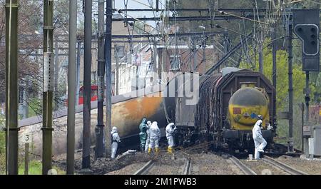 Illustration picture shows the draining of the wreck of the derailed train in Wetteren, Friday 10 May 2013. On Saturday night a freight train derailed and exploded on a track near Schellebelle (part of Wichelen, Wetteren). The train contained the chemical product acrylonitrile, a toxic and inflammable fluid that can cause breathing problems. Emergency services evacuated some 500 residents. One local resident died and 49 persons were brought to hospital.  Stock Photo