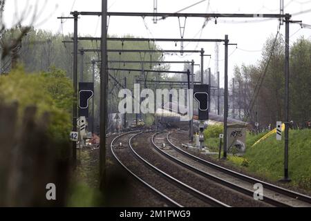 Illustration picture shows the wrecked train in Wetteren, Saturday 11 May 2013. In the night from Friday 3 to Saturday 4 May a freight train derailed and exploded on a track near Schellebelle (part of Wichelen, Wetteren). The train contained the chemical product acrylonitrile, a toxic and inflammable fluid that can cause breathing problems. Emergency services evacuated some 2000 residents. One local resident died and in a week, 397 persons were brought to hospital, for intoxication and control.  Stock Photo