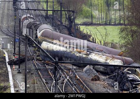 Illustration picture shows the the wrecked train from a ladder of fire brigade  in Wetteren, Saturday 11 May 2013. In the night from Friday 3 to Saturday 4 May a freight train derailed and exploded on a track near Schellebelle (part of Wichelen, Wetteren). The train contained the chemical product acrylonitrile, a toxic and inflammable fluid that can cause breathing problems. Emergency services evacuated some 2000 residents. One local resident died and in a week, 397 persons were brought to hospital, for intoxication and control. BELGA PHOTO POOL NICOLAS MAETERLINCK Stock Photo