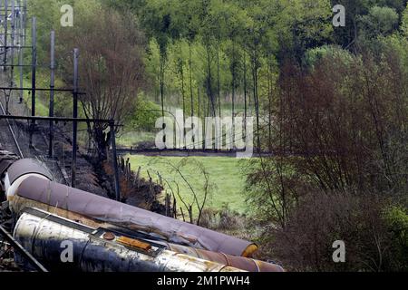 Illustration picture shows the the wrecked train from a ladder of fire brigade  in Wetteren, Saturday 11 May 2013. In the night from Friday 3 to Saturday 4 May a freight train derailed and exploded on a track near Schellebelle (part of Wichelen, Wetteren). The train contained the chemical product acrylonitrile, a toxic and inflammable fluid that can cause breathing problems. Emergency services evacuated some 2000 residents. One local resident died and in a week, 397 persons were brought to hospital, for intoxication and control. BELGA PHOTO POOL NICOLAS MAETERLINCK Stock Photo