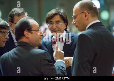 French President Francois Hollande, Prime Minister Elio Di Rupo and Italian Prime Minister Enrico Letta pictured during the round table at the start of a meeting of the European council on the second day of the EU summit of heads of state and government, at the EU headquarters in Brussels, Friday 28 June 2013.  Stock Photo