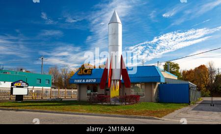 Ace Tire & Auto  Garage with rocket in front of business. Cambridge Ontario Canada Stock Photo