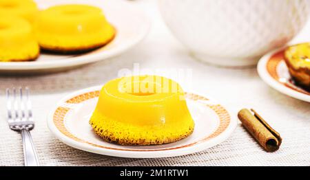 Brazilian quindim is a typical sweet from the northeast, It corresponds to the Portuguese recipe known as brisa-do-Lis, typical sweet made with eggs Stock Photo