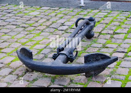 Old naval ship anchor on display Stock Photo