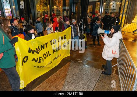 London, UK. 12 December 2022. Climate activists demonstrate outside Shell's where CEO Ben van Beurden leaving party is taking place Credit: Andrea Dom Stock Photo