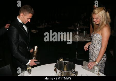 20140122 - LINT, BELGIUM: Essevee's Thorgan Hazard and and his partner Marie celebrate after the 60th edition of the 'Golden Shoe' award ceremony, Wednesday 22 January 2014, in Lint. The Golden Shoe (Gouden Schoen / Soulier d'Or) is an award for the best soccer player of the Belgian Jupiler Pro League championship during the calender year 2013. BELGA PHOTO VIRGINIE LEFOUR Stock Photo
