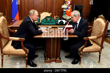Moscow, Russia. 12th Dec, 2022. Russian President Vladimir Putin holds a face-to-face meeting with Constitutional Court Chairman Valery Zorkin, right, at the Kremlin, December 12, 2022 in Moscow, Russia. Credit: Mikhail Metzel/Kremlin Pool/Alamy Live News Stock Photo