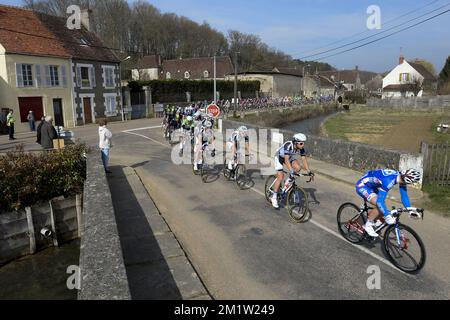 20140311 - MAGNY-COURS, FRANCE: Illustration picture shows the pack of cyclists during the third stage of the 72nd edition of Paris-Nice cycling race, 180km from Toucy to Circuit de Nevers Magny-Cours, Tuesday 11 March 2014.  Stock Photo