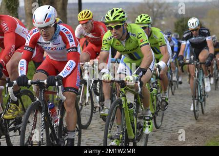 Illustration picture shows the pack of riders on the Oude Kwaremont during the 69th edition of the 'Dwars Door Vlaanderen' cycling race, 200,8 km from Roeselare to Waregem. Stock Photo