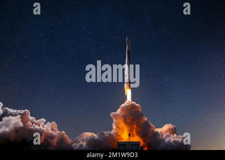 New space rocket with blast and smoke successfully takes off into starry space. Space ship lift off and launch Stock Photo
