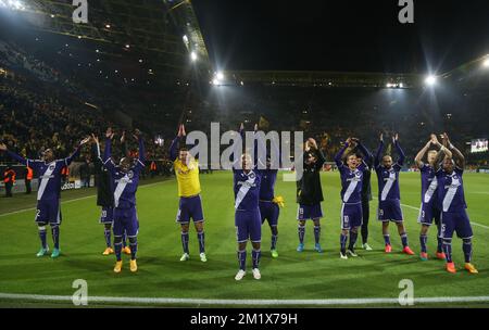 Anderlecht's players celebrate after a soccer game between German team Borussia Dortmund and Belgium's RSC Anderlecht, Tuesday 09 December 2014 in Dortmund, Germany, on the sixth and last day of the group stage of the UEFA Champions League competition, in the group D. Stock Photo