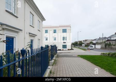 Terraced houses & the Chi Pras apartment block in Nansledan, a development by the Duchy of Cornwall in Newquay, Cornwall, South West England, UK Stock Photo