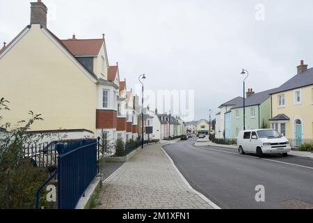 A variation of house styles on Stret Kosti Veur Woles in Nansledan, a development by the Duchy of Cornwall in Newquay, Cornwall,South West England, UK Stock Photo