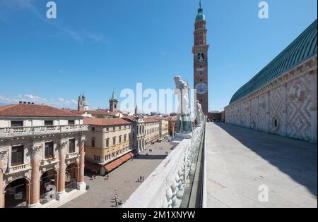 A detail of the copper roof of the Basilica Palladiana in Piazza dei Signori with clock tower Piazza Dei Signori in Vicenza, Italy Stock Photo