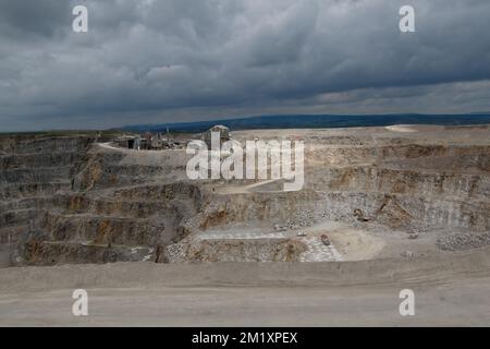Coldstones Quarry with equipment for processing limestone and digging the quarry, Nidderdale, North Yorkshire, England, UK. Stock Photo