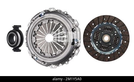 Car clutch set isolated on white background. Clutch disc and basket with release bearing. Stock Photo