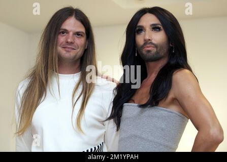 20150809 - ANTWERP, BELGIUM: Designer Wim Bruynooghe and Conchita Wurst pictured during at a press conference in Antwerp for the closing festival of Antwerp Pride, Sunday 09 August 2015. BELGA PHOTO NICOLAS MAETERLINCK Stock Photo