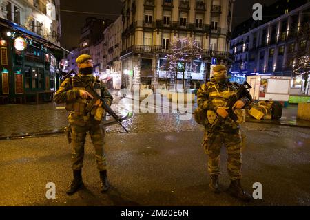 20151124 - BRUSSELS, BELGIUM: Illustration shows Military patrol near the Beurs/ La bourse, Tuesday 24 November 2015, in Brussels. The terrorist threat level is being kept at level four, the maximum in Brussels region, and has be maintained at level three for the rest of the country. The level 4 threat level for Brussels will be maintained until next Monday. All schools in Brussels and the subway stay closed. BELGA PHOTO NICOLAS MAETERLINCK Stock Photo