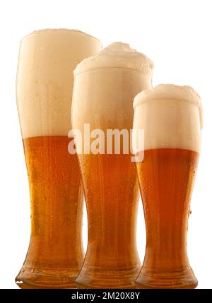 Set of beer into glass with foam and bubbles on a isolated on white background. Stock Photo