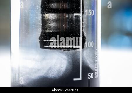 Iron nanoparticles in a lab, on a white glossy surface Stock Photo