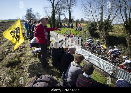 Illustration picture shows the pack of cyclists at the Oude Kwaremont in Kluisbergen during the 100th edition of the 'Ronde van Vlaanderen - Tour des Flandres - Tour of Flanders' one day cycling race, 255km from Zedelgem to Oudenaarde, Sunday 03 April 2016.  Stock Photo