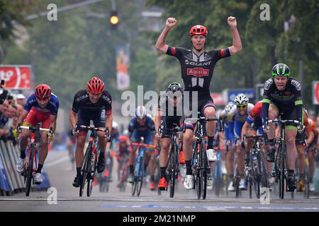 Belgian Zico Waeytens of Team Giant-Alpecin (C) celebrates as he wins before New-Zealand's Daniel McLay of Fortuneo-Vital Concept (R) the sprint at the finish of the final stage of the Baloise Belgium Tour cycling race, 174,2km from Tremelo to Tongeren, on Sunday 29 May 2016.  Stock Photo