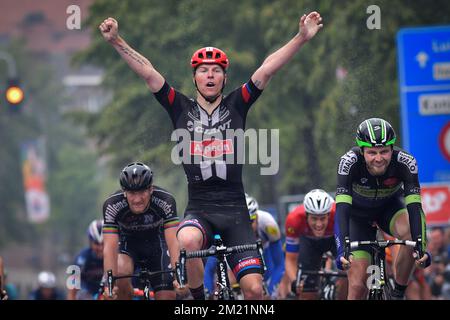 Belgian Zico Waeytens of Team Giant-Alpecin (C) celebrates as he wins before New-Zealand's Daniel McLay of Fortuneo-Vital Concept (R) the sprint at the finish of the final stage of the Baloise Belgium Tour cycling race, 174,2km from Tremelo to Tongeren, on Sunday 29 May 2016.  Stock Photo